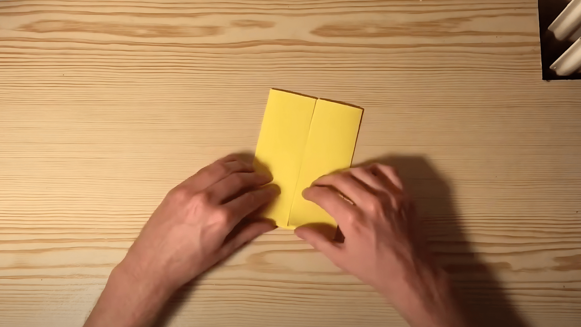 Next_fold_the_same_paper_in_half_vertically_making_a_clear_crease_down_the_middle